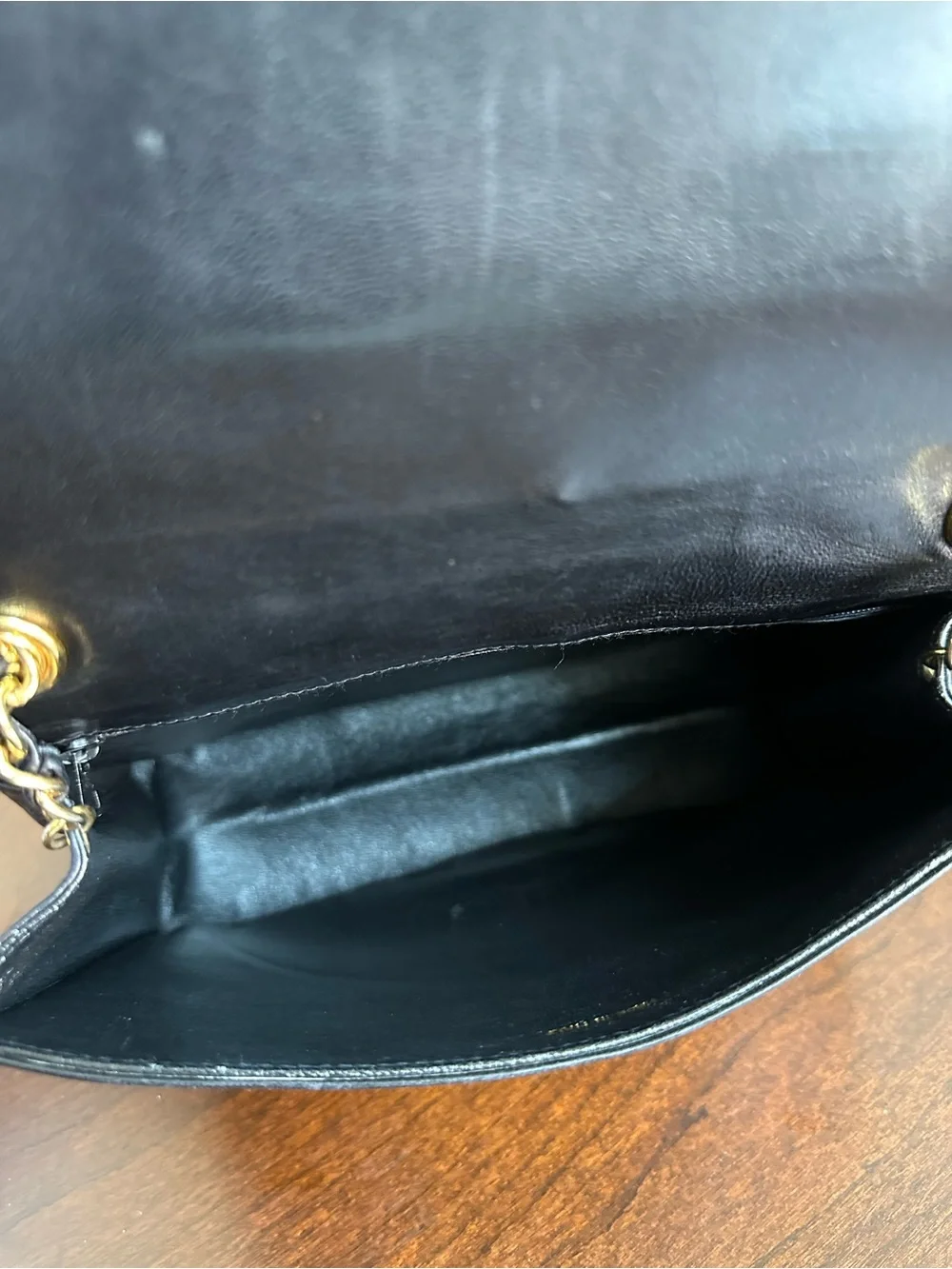 CHANEL Black Quilted Lambskin Shoulder Bag with Gold Chain Detail